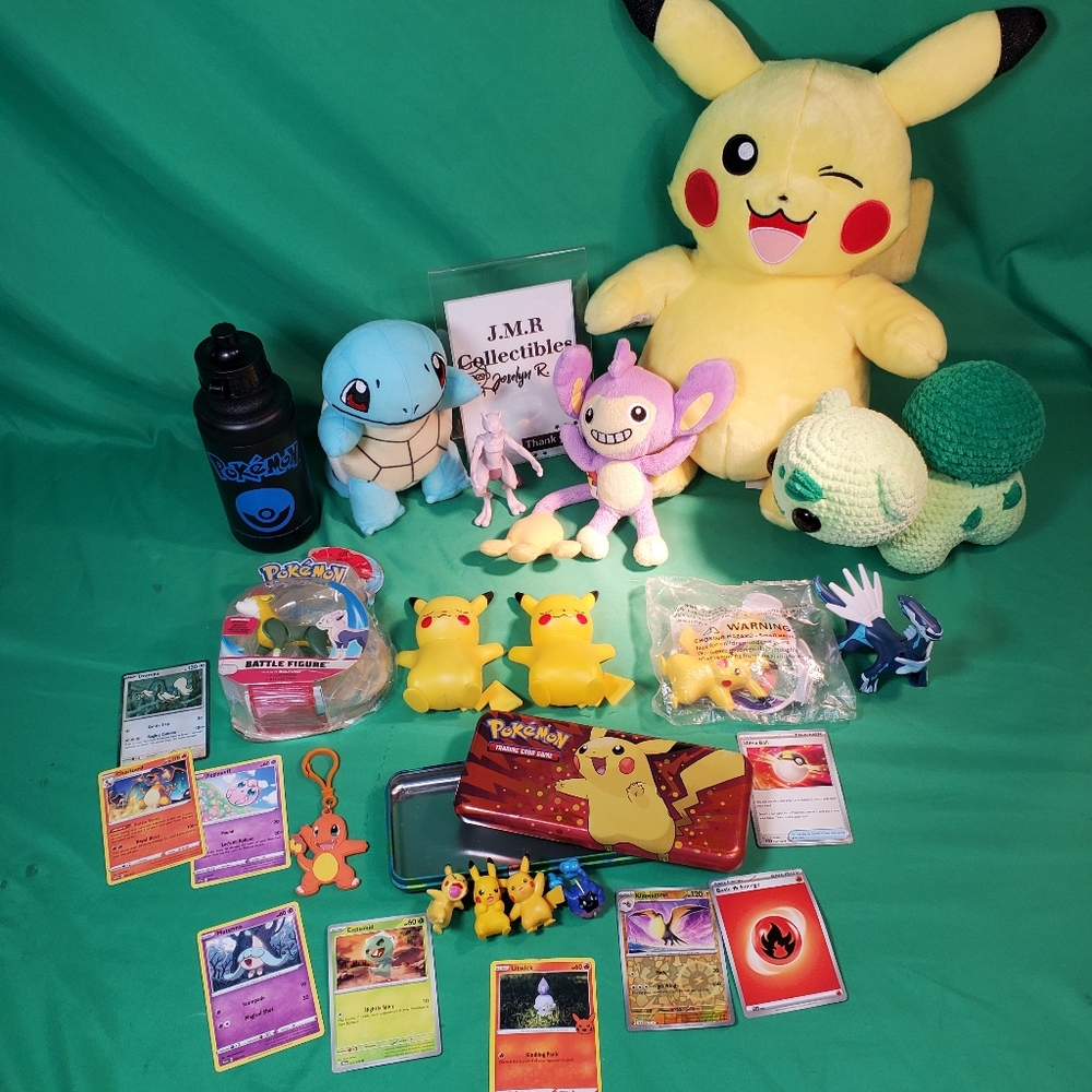 Large Lot of Pokémon Toys, Plushies, Trading Cards, and Collectibles used,
